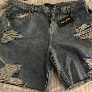 Blue and black destroyed Jean shorts
